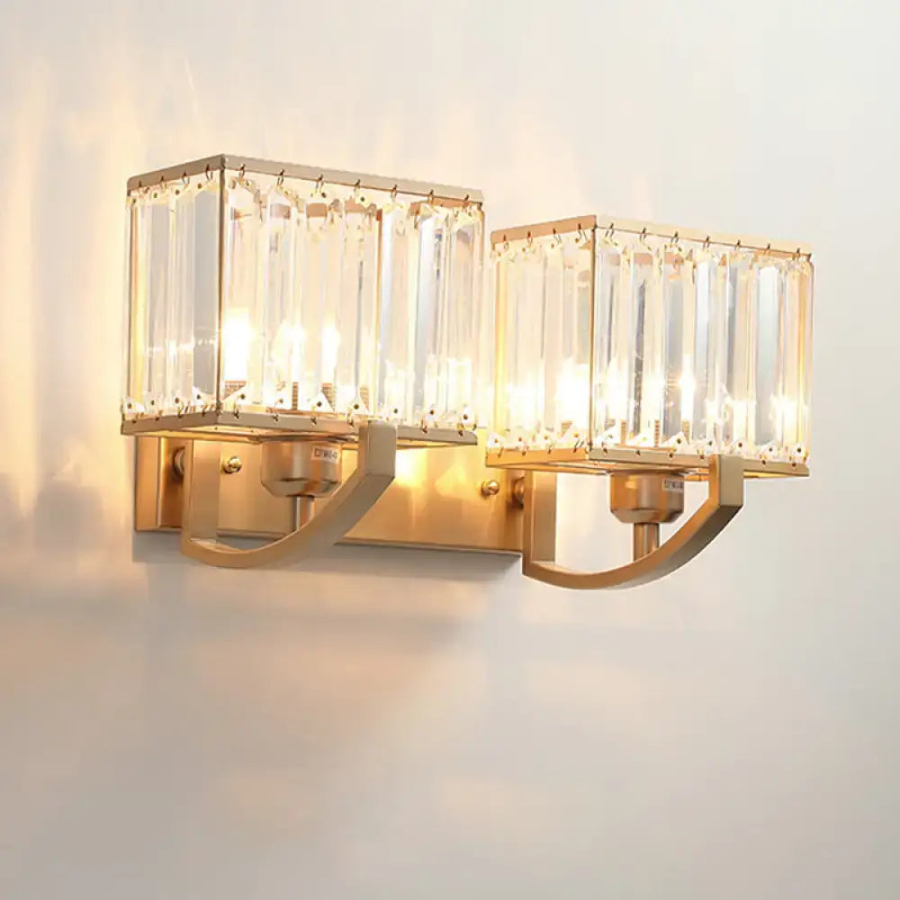 Crystal wall sconce light by Decorbites with dual rectangular glass prisms in brass finish on Tampa Home & Garden Store