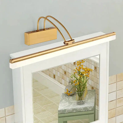 Decorbites bronze LED wall light vanity fixture with curved arms above a framed mirror on Tampa Home & Garden Store