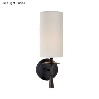 Bronze white glass wall sconce by Decorbites with cylindrical shade and round backplate on Tampa Home & Garden Store
