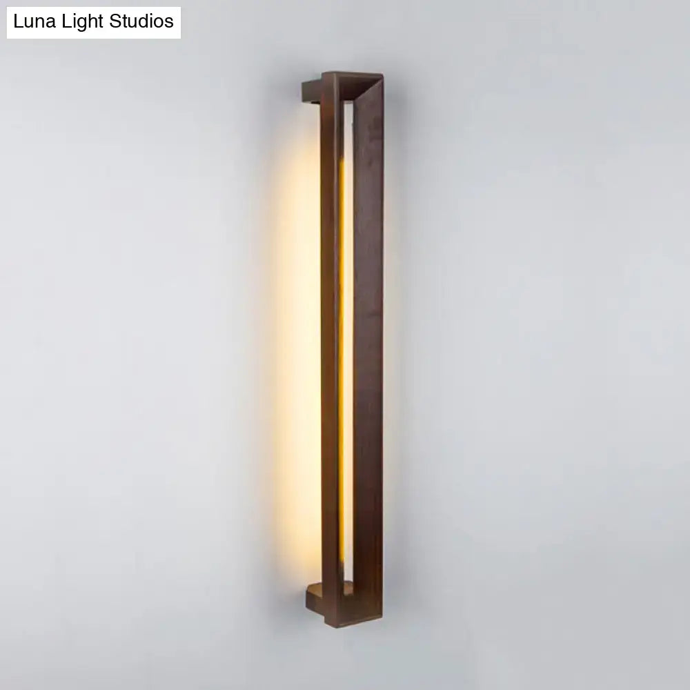 Dark Wood LED Sconce by Decorbites, vertical walnut frame with warm ambient light on Tampa Home & Garden Store
