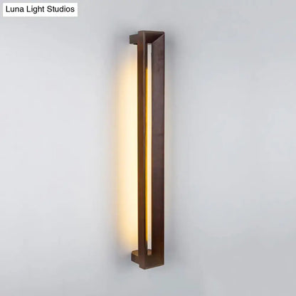 Dark Wood LED Sconce by Decorbites, vertical walnut frame with warm ambient light on Tampa Home & Garden Store