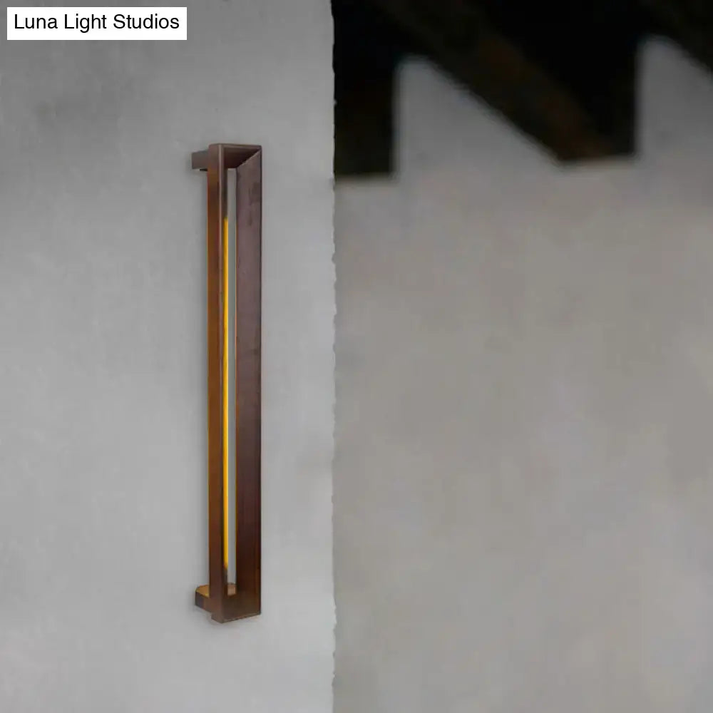 Dark Wood LED Sconce by Decorbites; slim vertical wall light with warm amber glow on Tampa Home & Garden Store