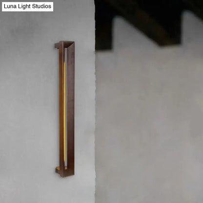 Dark Wood LED Sconce by Decorbites; slim vertical wall light with warm amber glow on Tampa Home & Garden Store