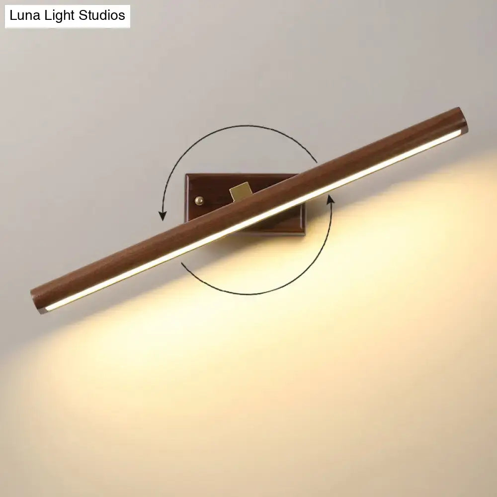 Dark wood linear wall sconce with LED bar by Decorbites on Tampa Home & Garden Store