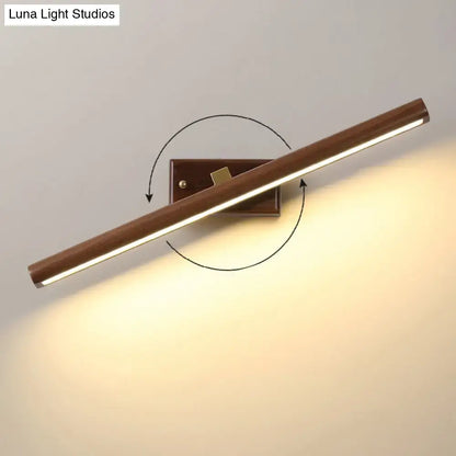 Dark wood linear wall sconce with LED bar by Decorbites on Tampa Home & Garden Store