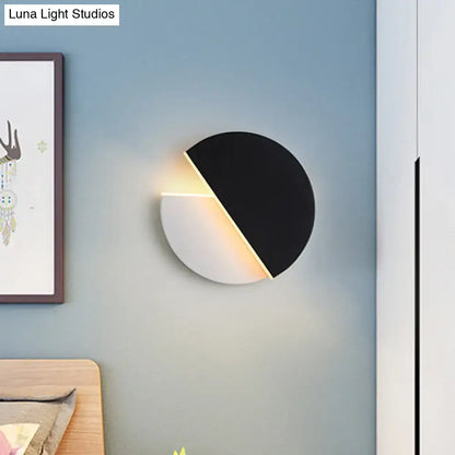 Decorbites black white semicircle wall sconce with warm LED glow on Tampa Home & Garden Store