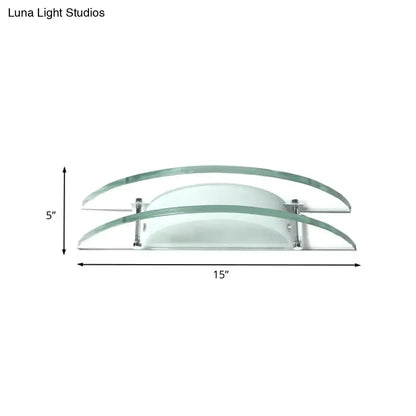 Chrome Dual Arc Wall Sconce with curved glass arcs and frosted diffuser by Decorbites on Tampa Home & Garden Store