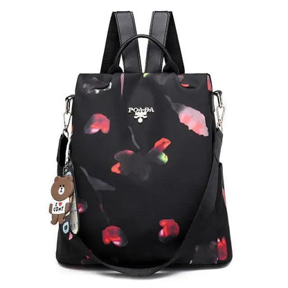 Stevvex waterproof black backpack with red floral print, anti-theft school bag with bear charm on Tampa Home & Garden Store