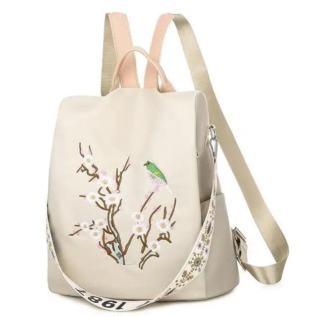 Stevvex waterproof women's backpack beige with floral embroidery and green bird on Tampa Home & Garden Store