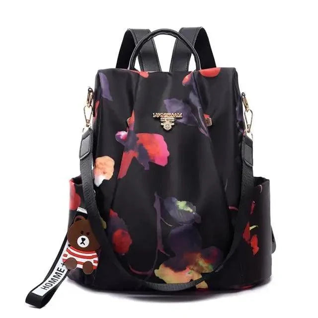 Stevvex waterproof women's backpack with floral print on black fabric, anti-theft on Tampa Home & Garden Store