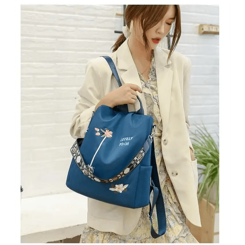 Stevvex blue waterproof backpack with floral print for school use on Tampa Home & Garden Store