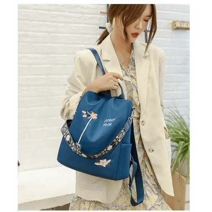 Stevvex blue waterproof backpack with floral print for school use on Tampa Home & Garden Store