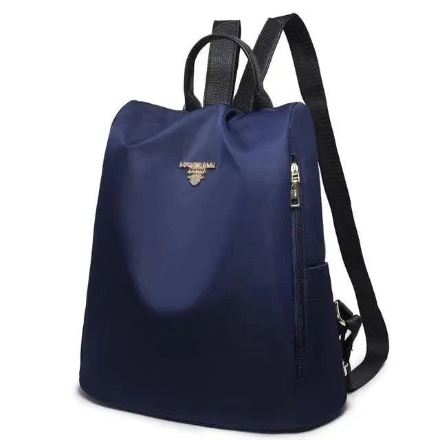 Backpack Stevvex navy blue waterproof women's school bag with top handle and black straps on Tampa Home & Garden Store