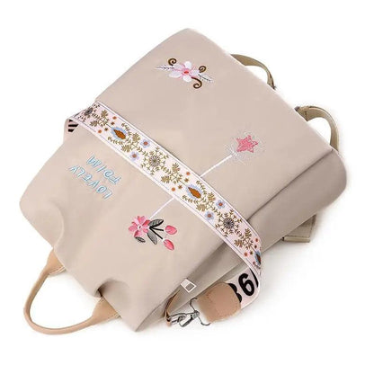 Stevvex beige waterproof women's school backpack with floral embroidery and wide strap on Tampa Home & Garden Store