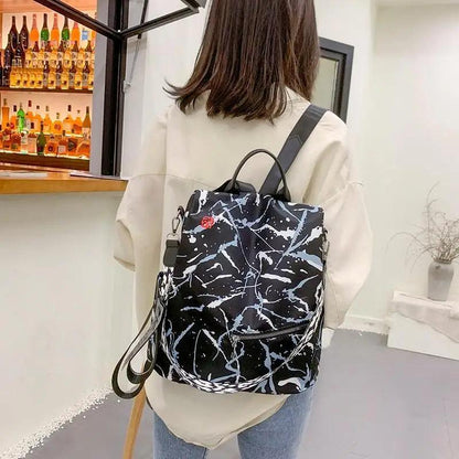 Stevvex waterproof women's backpack with black marble print, anti-theft design on Tampa Home & Garden Store