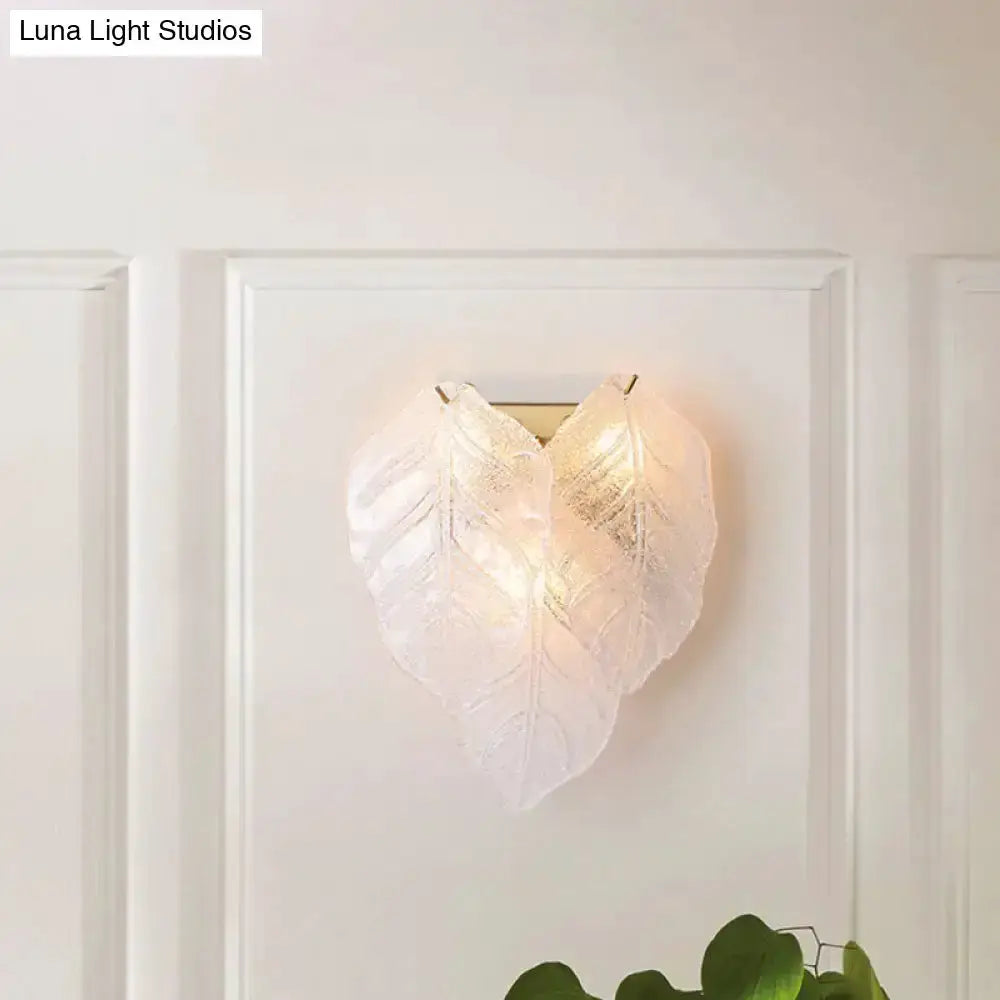Modern frosted white glass leaf wall sconce light by Decorbites for hallway lighting on Tampa Home & Garden Store