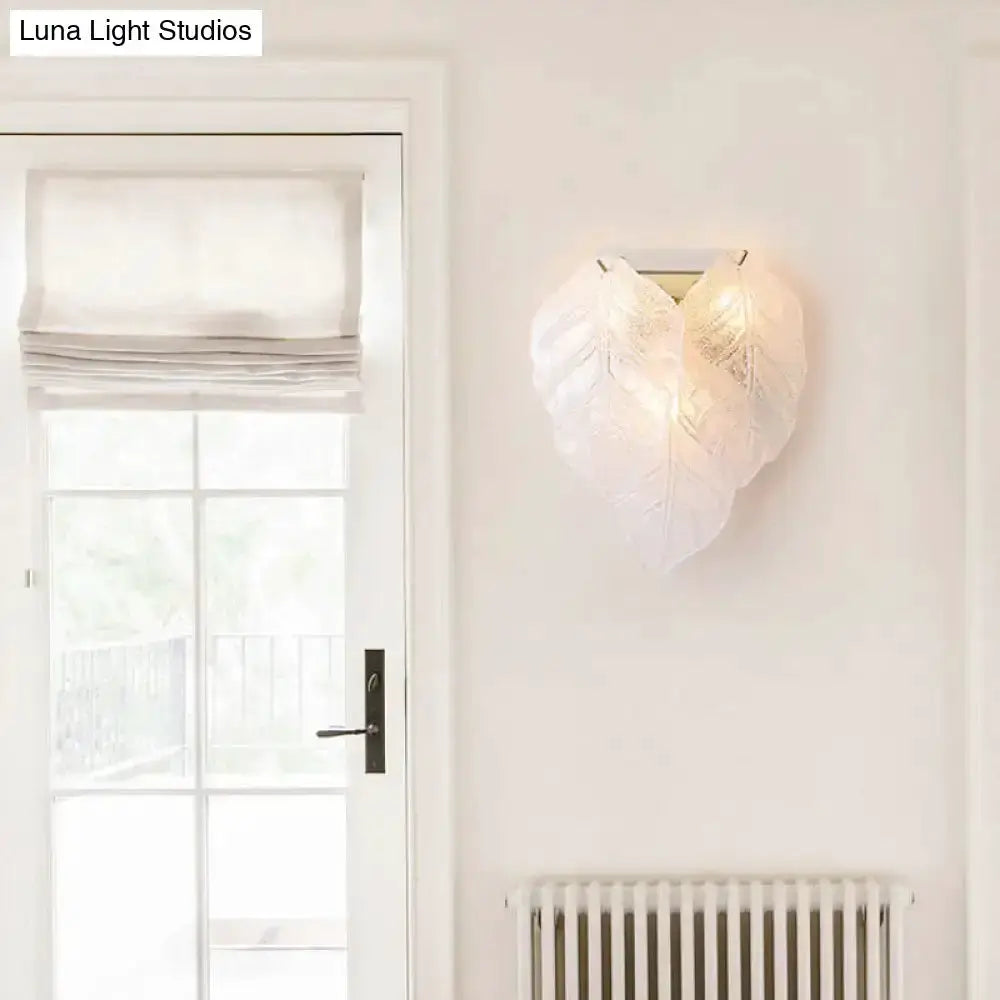 Modern frosted white glass leaf wall sconce for hallway on Tampa Home & Garden Store