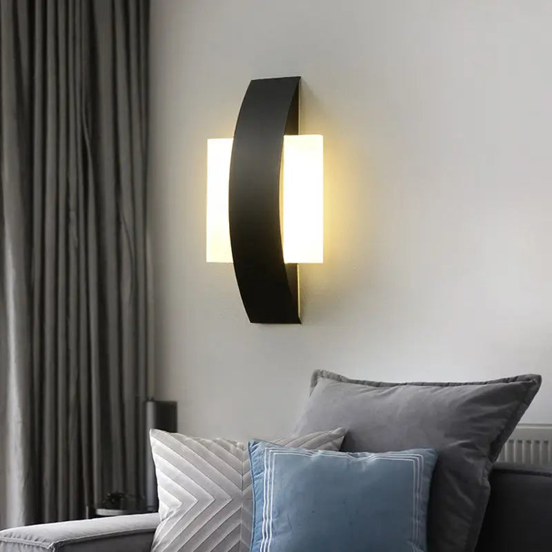 Black LED Round Wall Sconce by Decorbites curved black metal wall light with white panel on Tampa Home & Garden Store