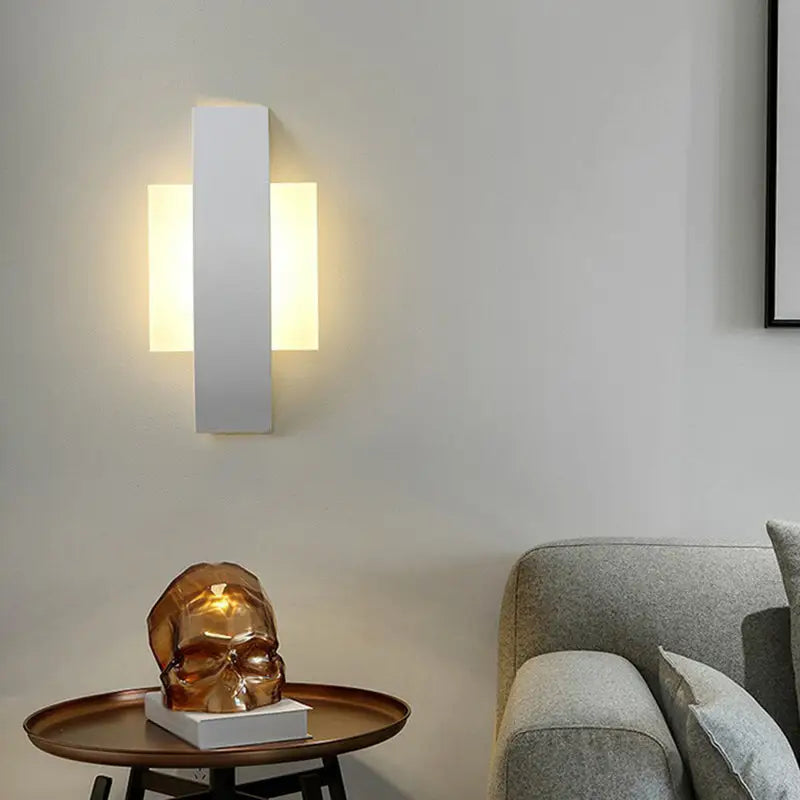 Black LED round living room wall sconce Decorbites with warm white glow on Tampa Home & Garden Store