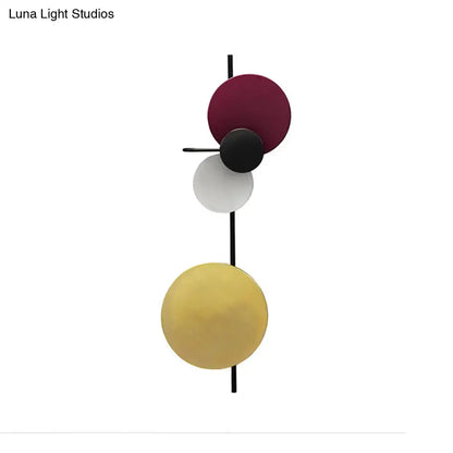 Wall sconce by Decorbites, adjustable multi-disc design in red pink blue on black rod on Tampa Home & Garden Store