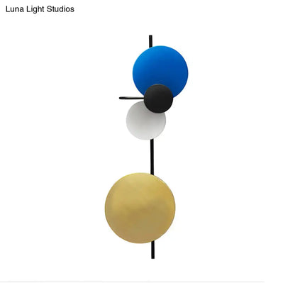 Decorbites Luna Wall Sconce with stacked blue white black yellow discs adjustable design on Tampa Home & Garden Store