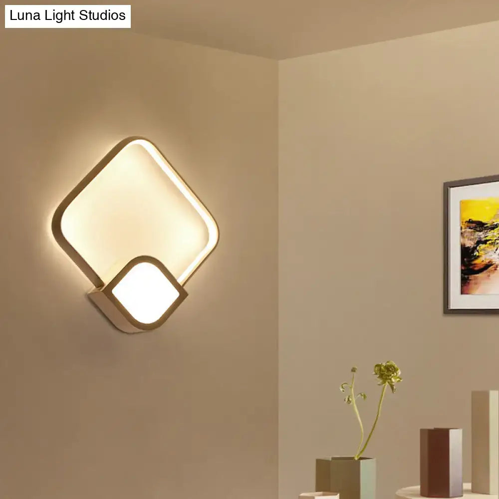 White acrylic square LED wall sconce by Decorbites with overlapping rounded-square frames on Tampa Home & Garden Store