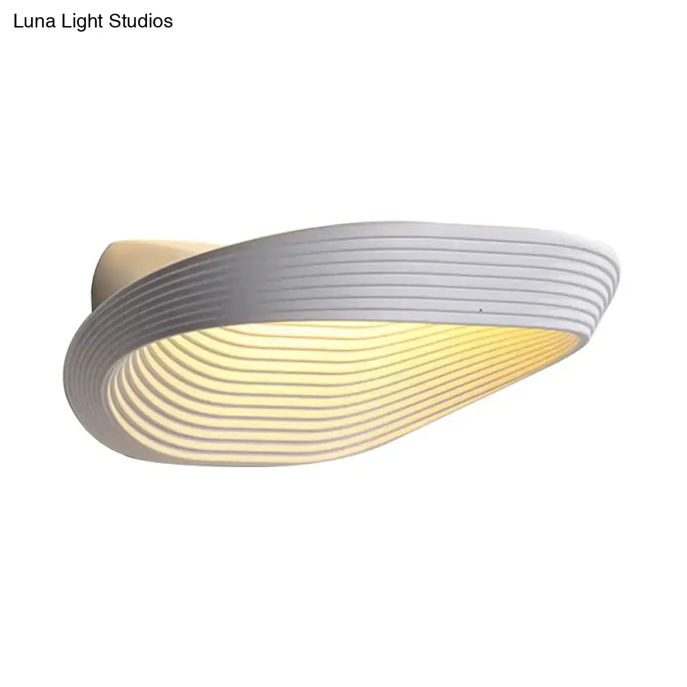 White Black Wall Light with ribbed curved shade, warm glow on Tampa Home & Garden Store