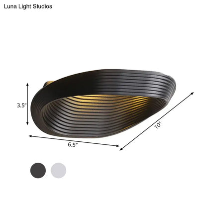 Wall light by Decorbites black ribbed with curved oval shade on Tampa Home & Garden Store