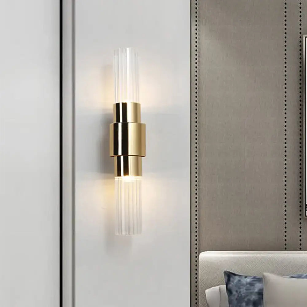 Gold glass ribbed bathroom sconce by Decorbites, brass finish on Tampa Home & Garden Store