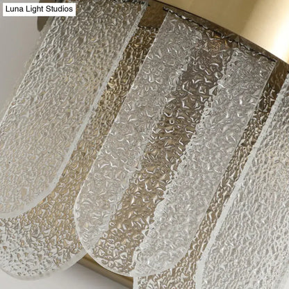 Gold hammered glass four-head wall sconce by Decorbites with curved panels on Tampa Home & Garden Store