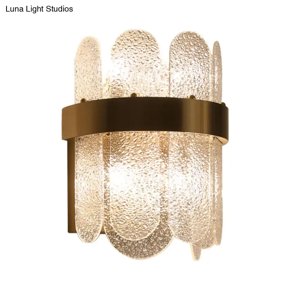 Gold hammered glass four-head wall sconce with brass band on Tampa Home & Garden Store