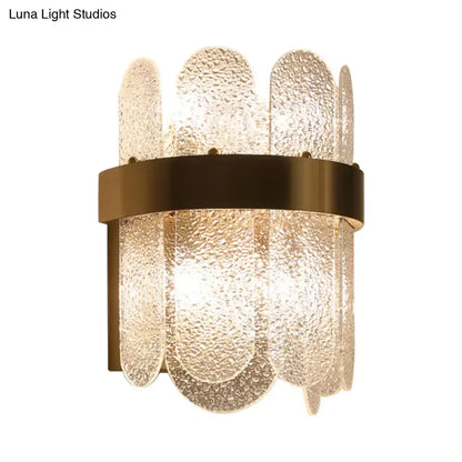Gold hammered glass four-head wall sconce with brass band on Tampa Home & Garden Store