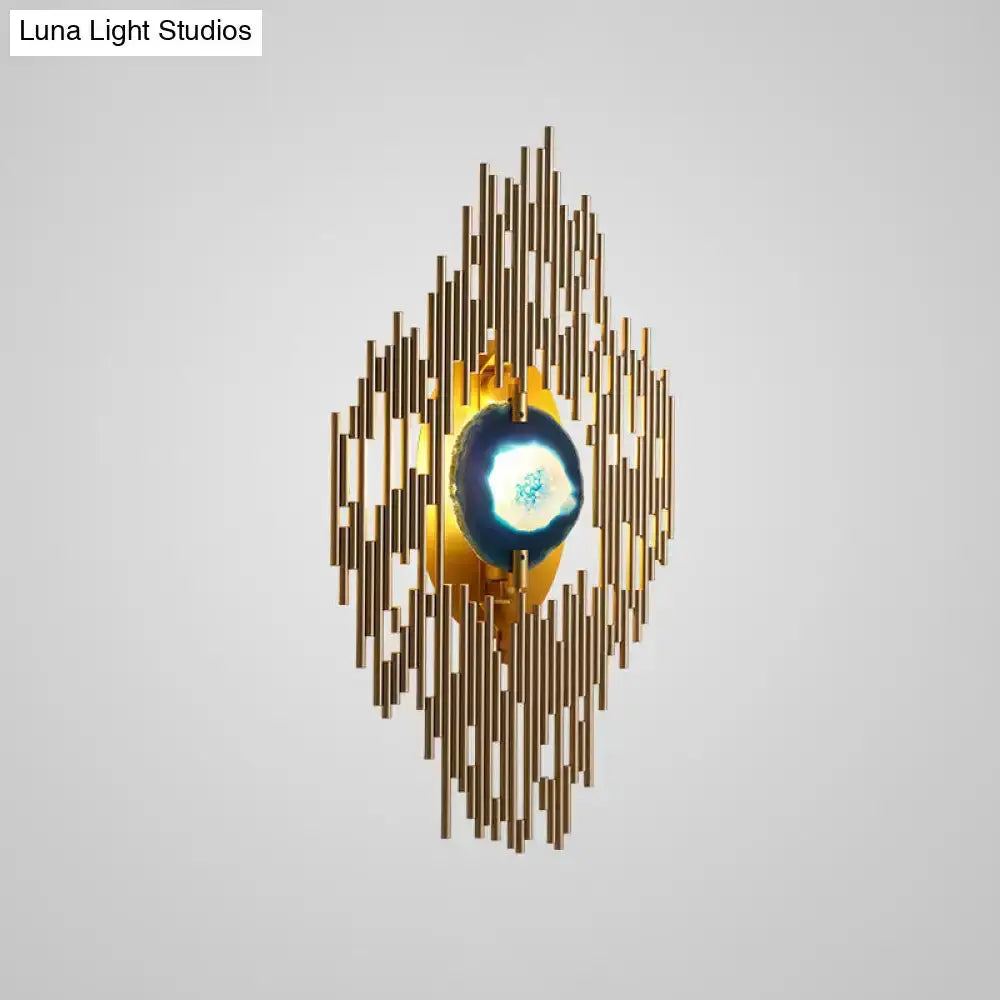 Modern gold agate deco wall sconce with brass spokes around blue agate centerpiece on Tampa Home & Garden Store