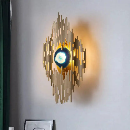 Modern gold agate deco wall sconce with blue center disc by Decorbites on Tampa Home & Garden Store