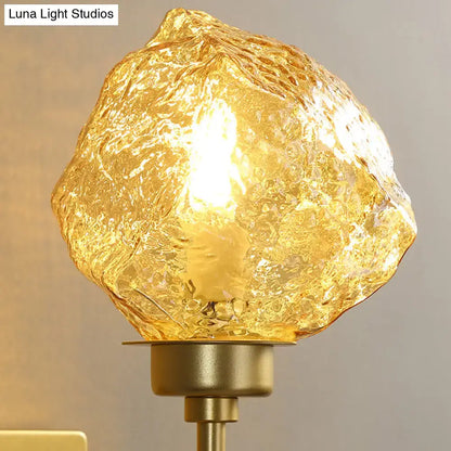 Amber smoke glass sconce with brass base by Decorbites on Tampa Home & Garden Store