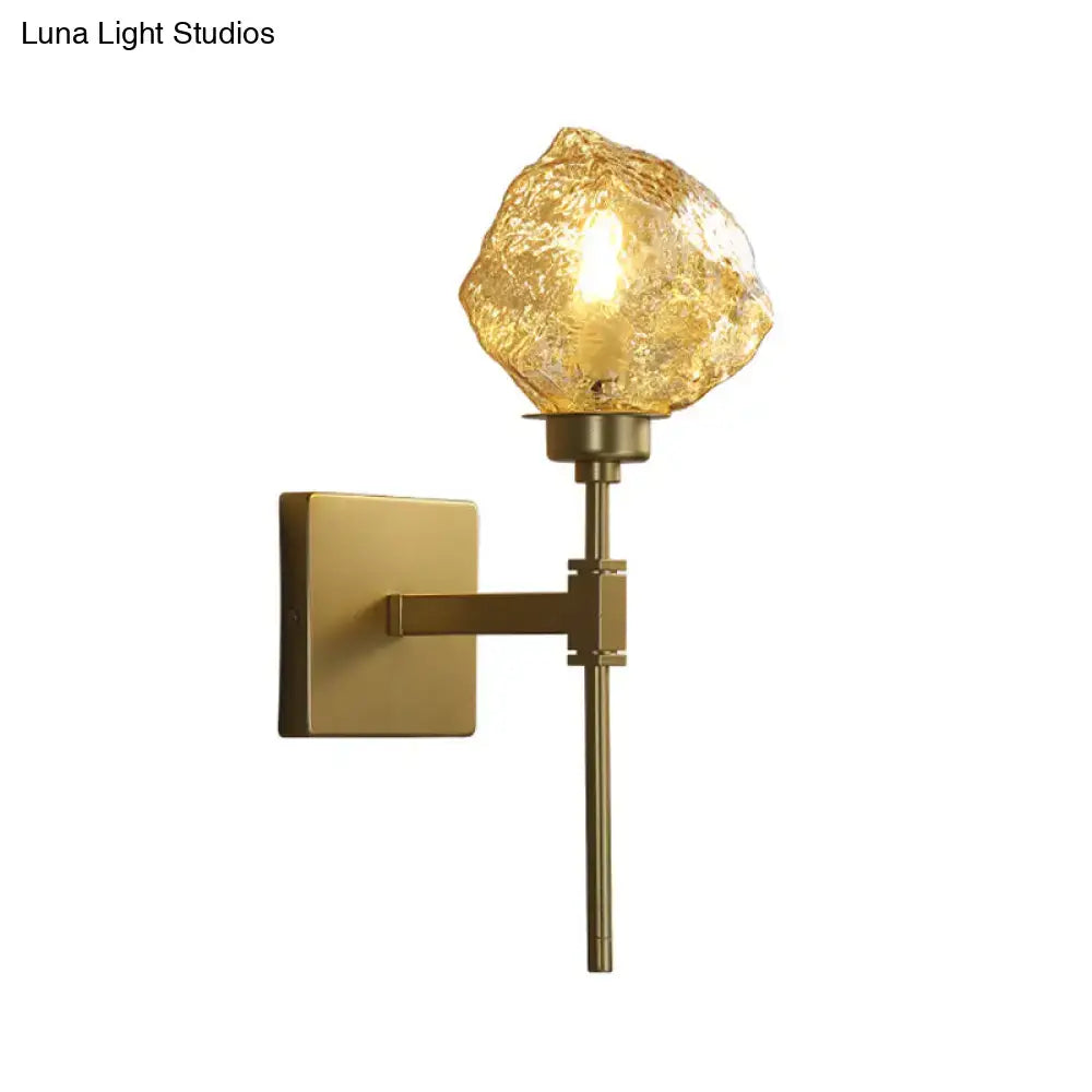 Amber Smoke Glass Sconce with brass wall mount, square backplate and irregular glass shade on Tampa Home & Garden Store