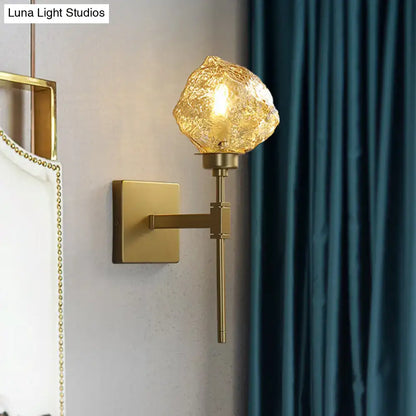Amber smoke glass wall sconce with brass finish and square backplate by Decorbites on Tampa Home & Garden Store