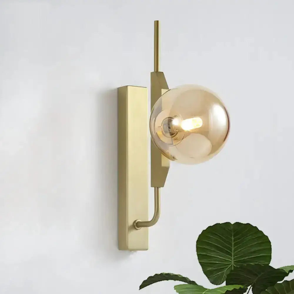 Gold brass wall light with amber glass orb by Decorbites, 110–120V bedroom on Tampa Home & Garden Store