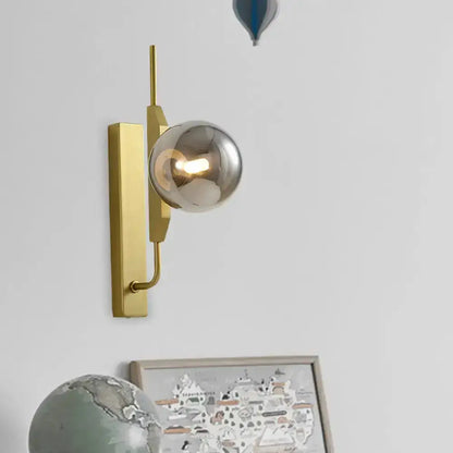 Amber glass orb wall light with gold brass finish by Decorbites for bedroom 110v-120v on Tampa Home & Garden Store