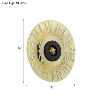 Decorbites gold black disk laser-cut sconce with sunburst rays, 13 in diameter on Tampa Home & Garden Store