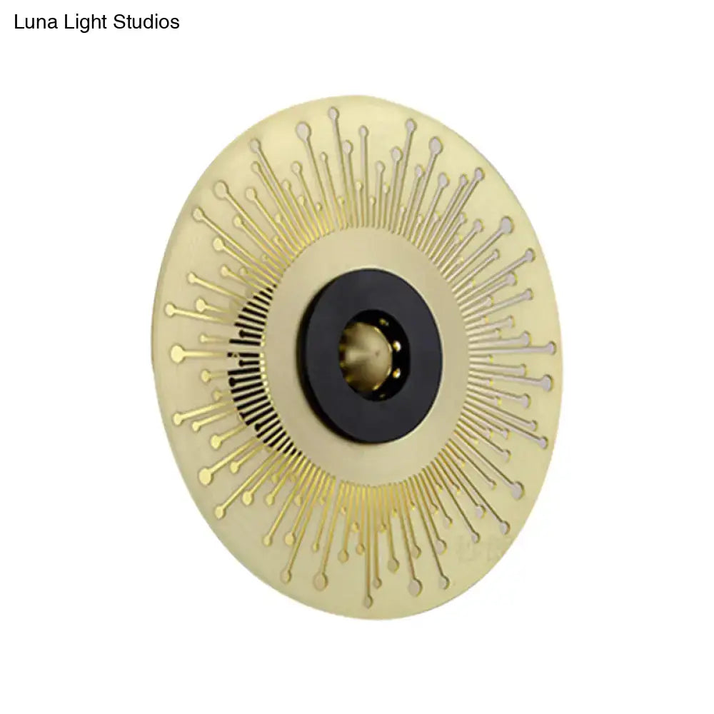 Gold and black disk laser-cut sconce by Decorbites with sunburst rays and black center ring on Tampa Home & Garden Store
