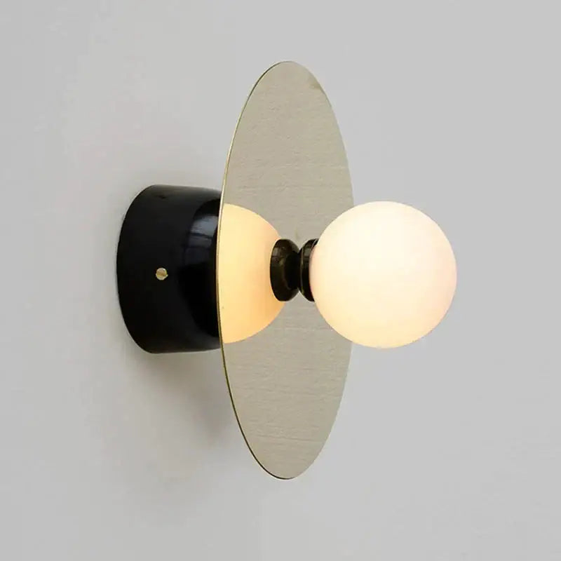 Gold Black Riya wall light wall sconce with frosted globe bulb by Decorbites on Tampa Home & Garden Store
