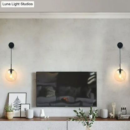 Gold Black Spherical Wall Light pair in black metal with clear glass globes on Tampa Home & Garden Store