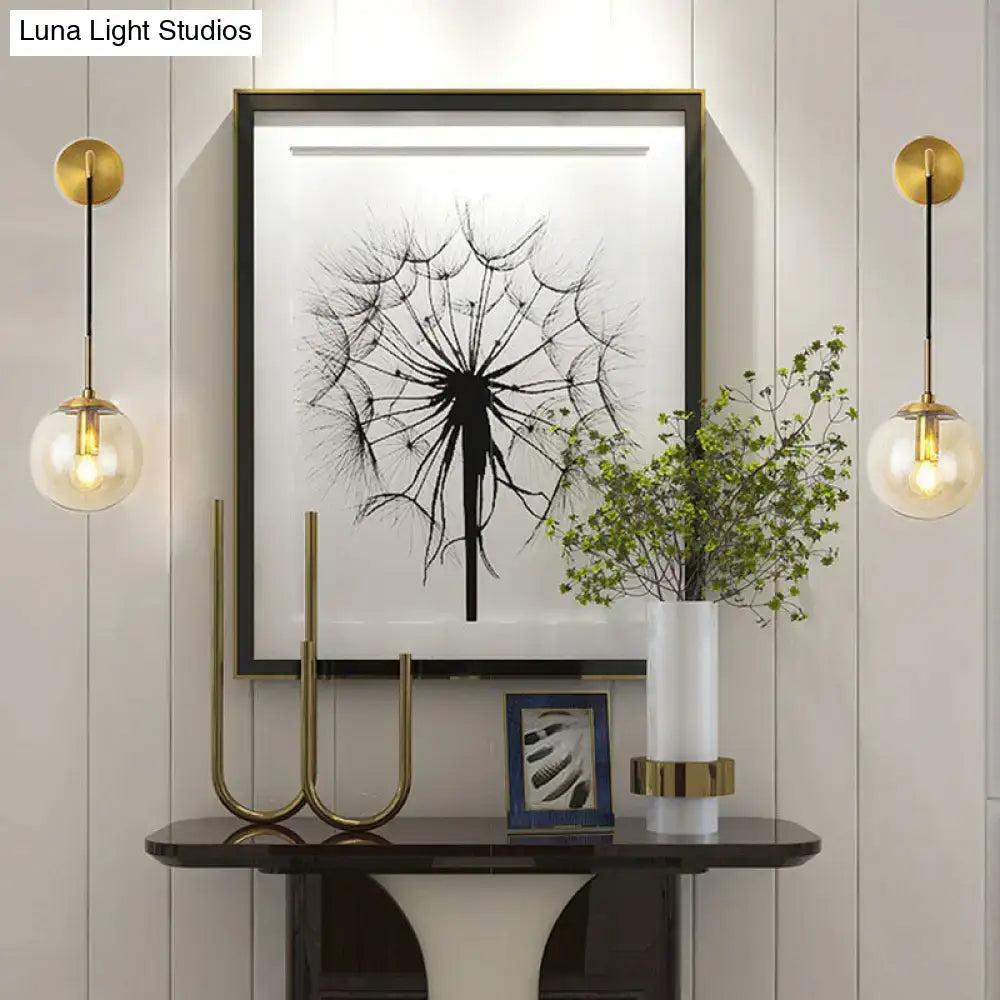 Decorbites gold black spherical glass globes wall sconces, pair with brass accents on Tampa Home & Garden Store