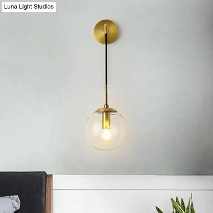 Gold Black Spherical Wall Light with clear glass globe and brass accents Decorbites on Tampa Home & Garden Store