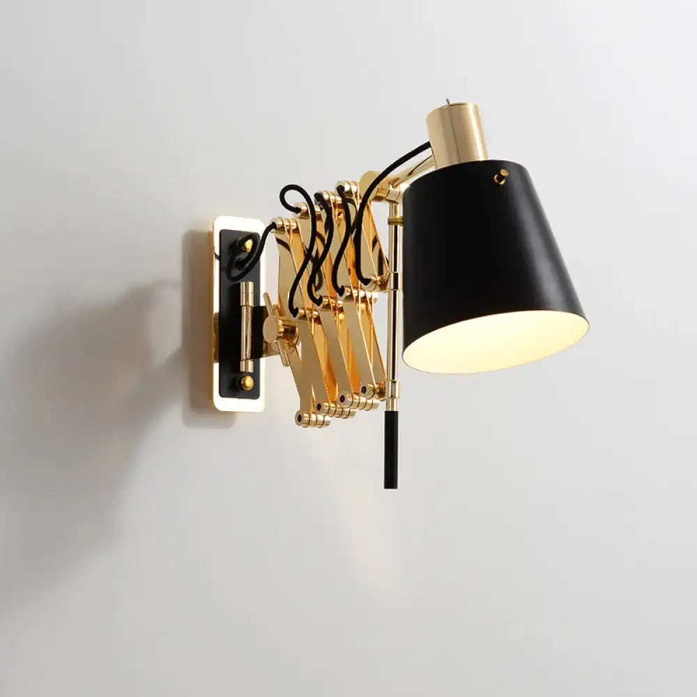 Decorbites gold black barrel wall sconce with brass adjustable arms and black shade on Tampa Home & Garden Store