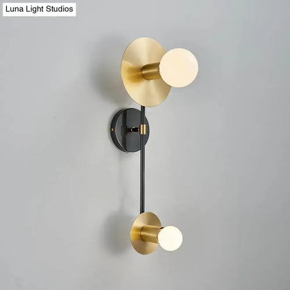 Gold Black Opal Wall Sconce by Decorbites; brass discs, black backplate, dual frosted opal bulbs on Tampa Home & Garden Store