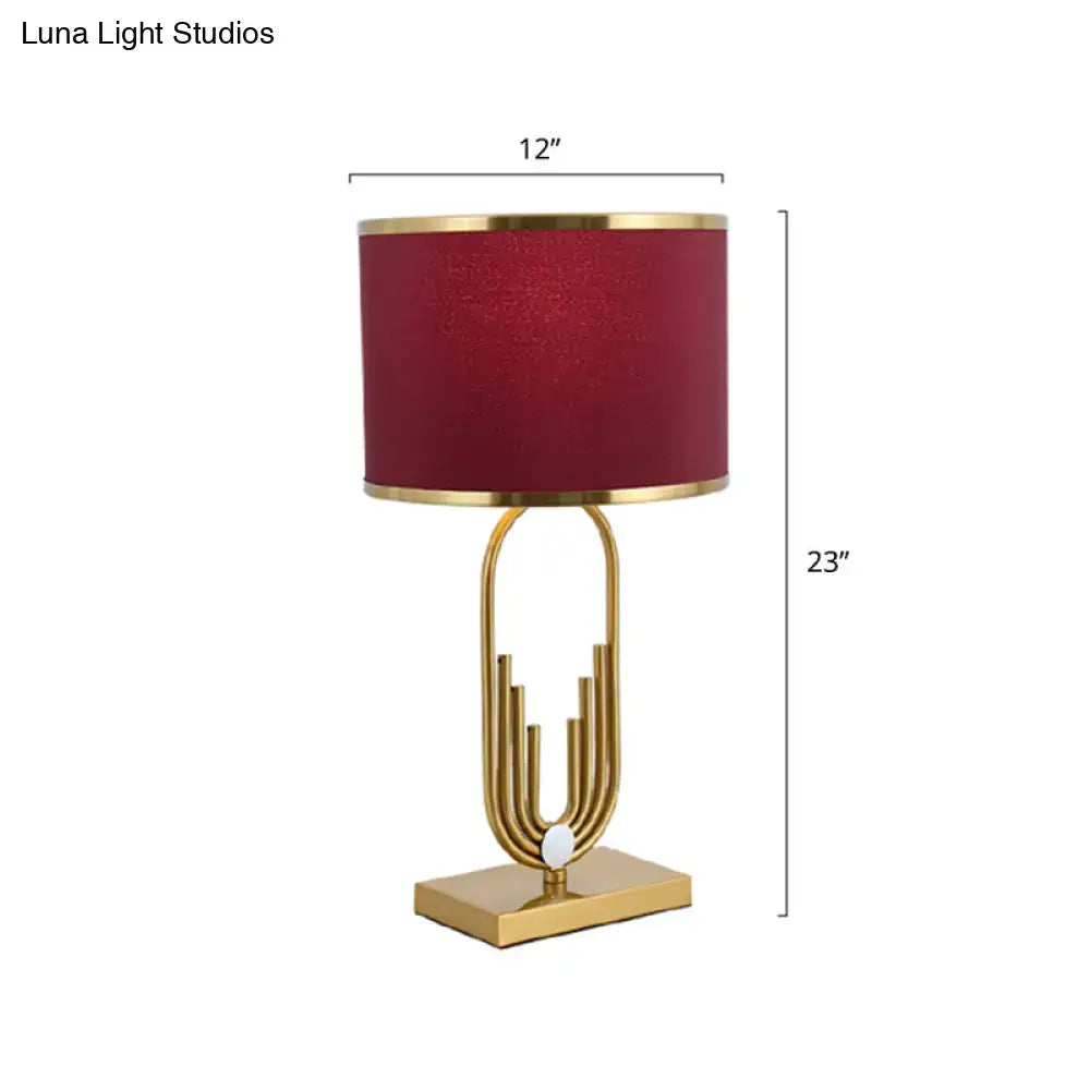 Gold burgundy fabric lamp by Decorbites with gold metal frame, 23in tall and 12in shade on Tampa Home & Garden Store