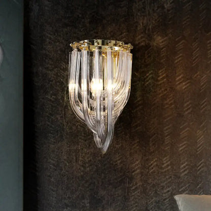 Gold glass geometric clear sconce with hanging prism strands, wall-mounted brass finish on Tampa Home & Garden Store