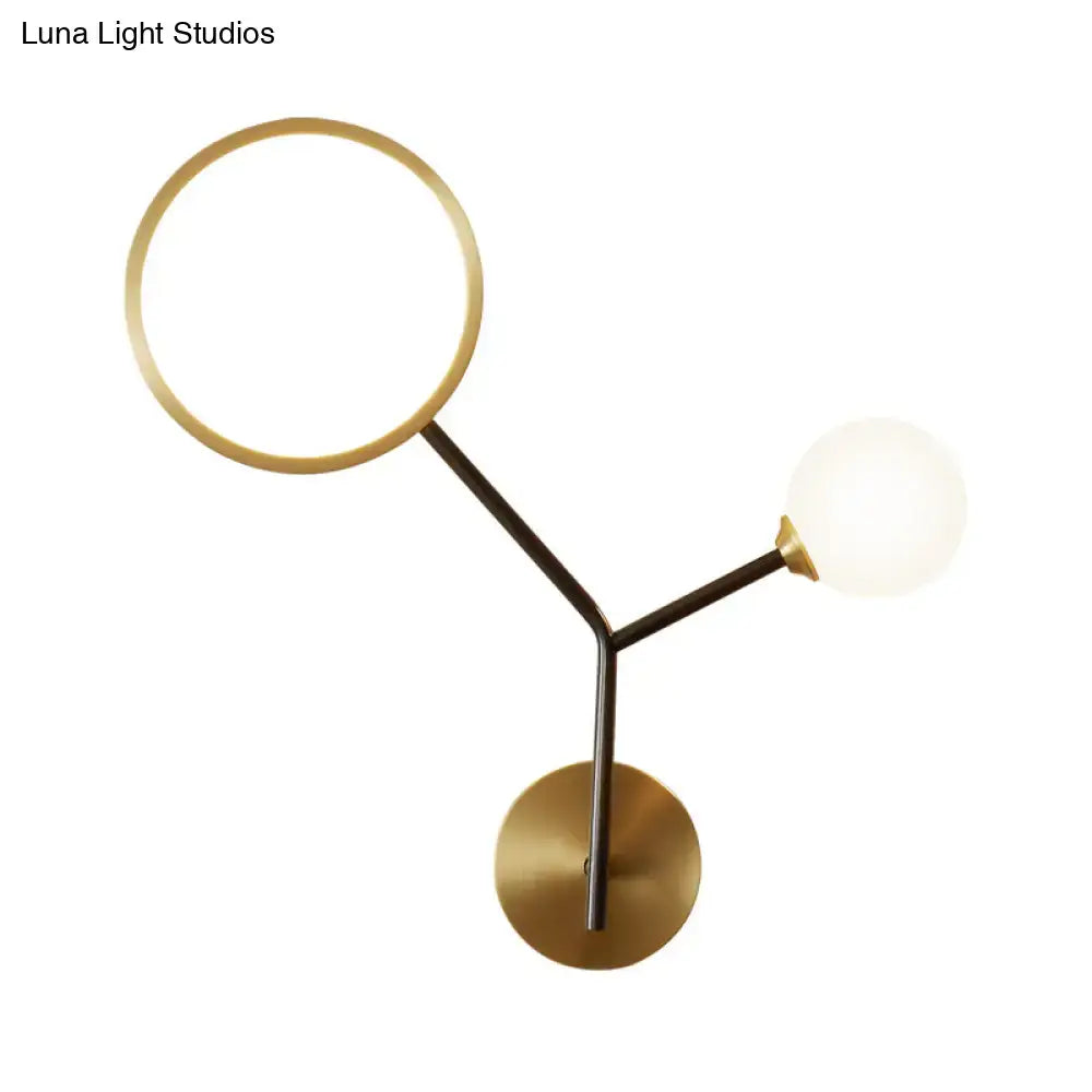 Gold Cream Glass Compact Wall Sconce with halo and frosted globe on black metal stem on Tampa Home & Garden Store